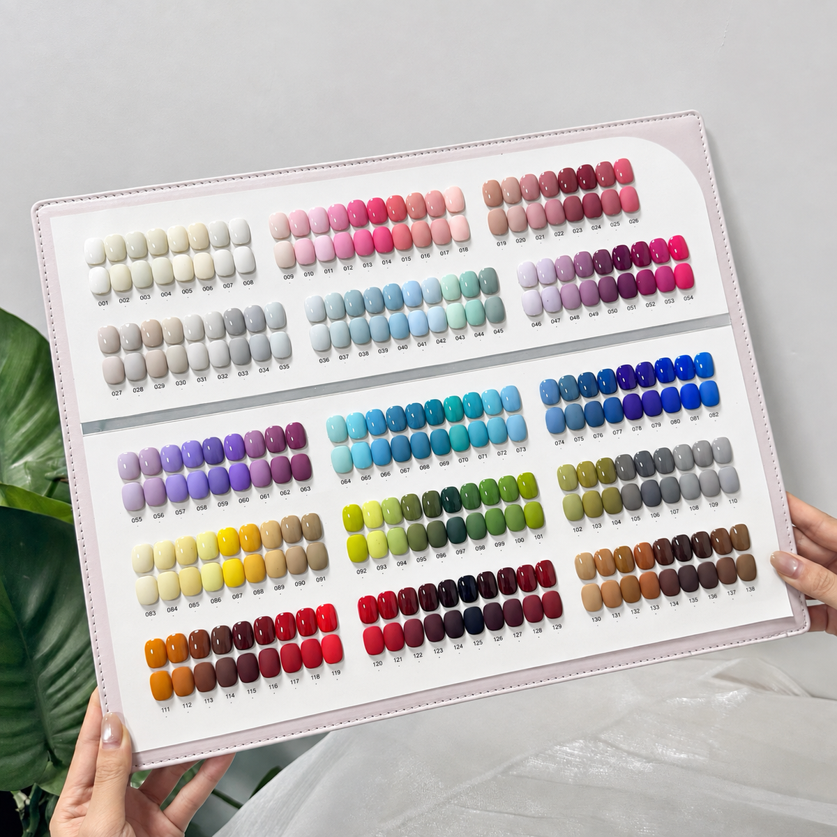 Press-on nail color palette and hand-painted design samples